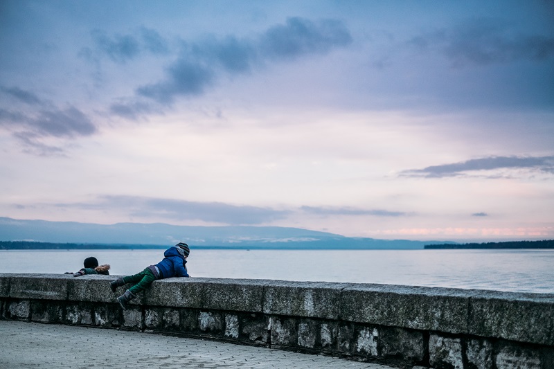 kids looking out over water